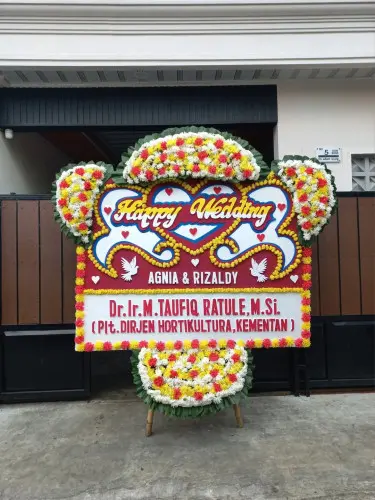 Papan Bunga Pernikahan the icon